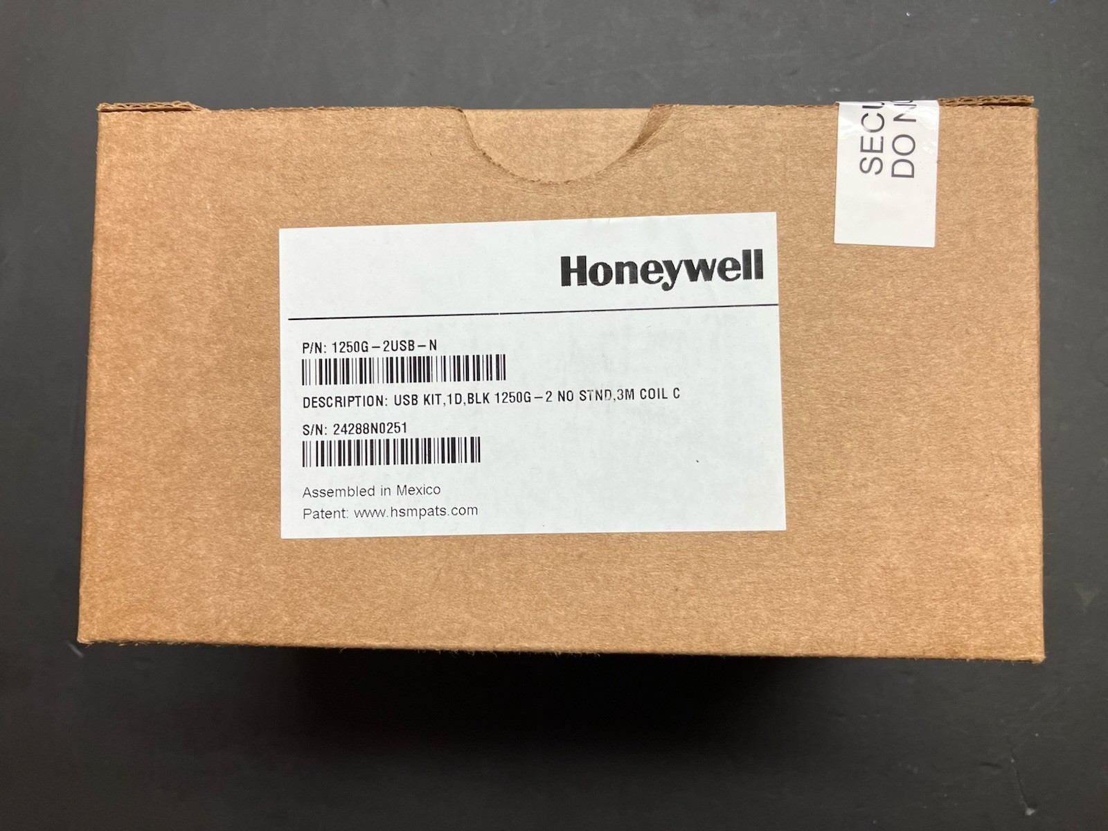 Imagen del Honeywell Voyager 1250g 1250G-2USB-1, lector láser de código de barras 1D con cable USB.